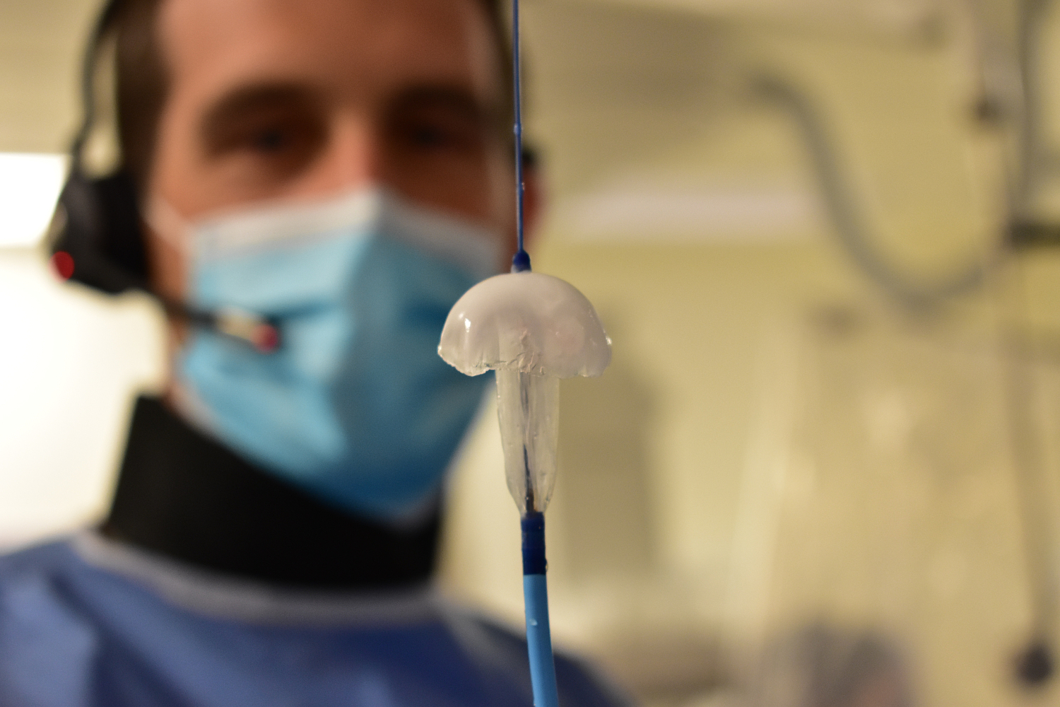 Dr Greg Mellor holding the cryoballoon device in his hand.jpg